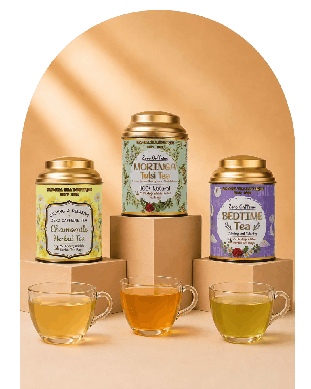 Three tea tins in different colors (yellow-green, green, and purple) with gold lids are displayed on cardboard risers with three glass teacups in front on a beige background with a soft arch shadow.